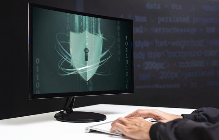 Hacker cracking the binary code data security